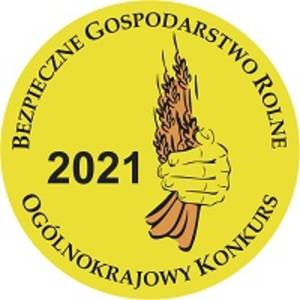 logo konkursu Bezpieczne Gospodarstwo Rolne 2021; ręka trzymająca kłosy zboża